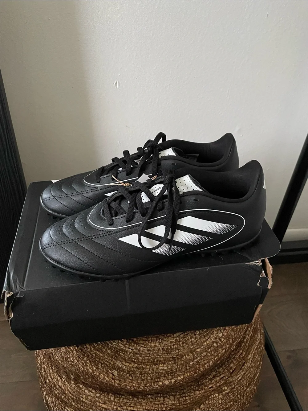 Adidas women’s Black Turf Soccer Shoes with White Stripes